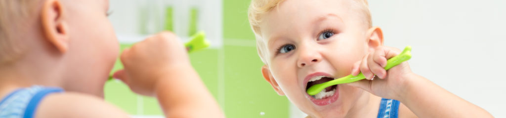 child brushing his teeth and building great oral hygiene habits